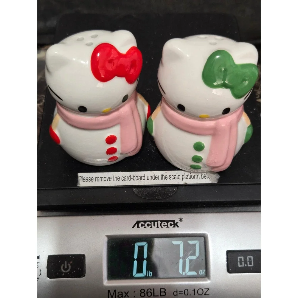 Sanrio Hello Kitty Snowman Salt and Pepper Shakers Holiday Ceramic Set Pink Bow